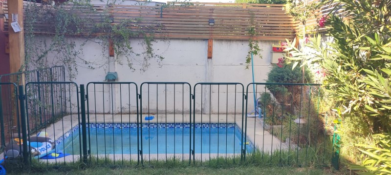 CASA CON 4 DORMITORIOS PISCINA Y QUINCHO REMODELADA